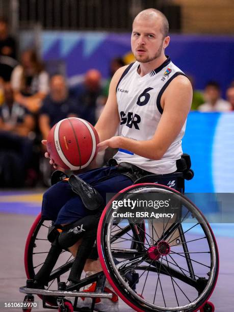 Kyle Marsh of Great Britain dribbles with the ball during the Men's Wheelchair Basketball Final game between Spain and Great Britain on Day 12 of the...