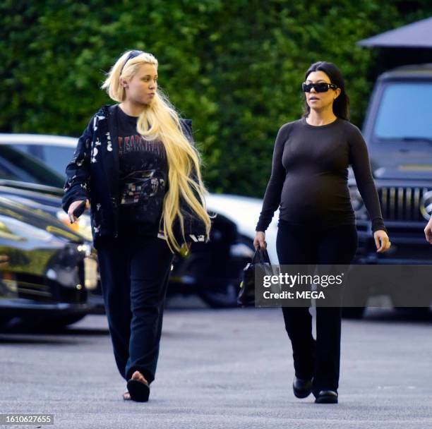 Alabama Barker and Kourtney Kardashian are seen leaving Cecconi's on August 18, 2023 in Los Angeles, California.