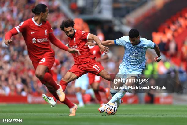 Mohamed Salah of Liverpool and Dominic Solanke of AFC Bournemouth during the Premier League match between Tottenham Hotspur and Manchester United at...