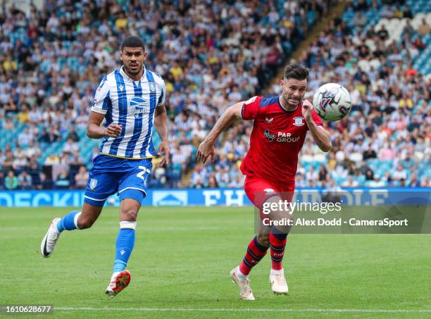 Sheffield Wednesday's Ashley Fletcher battles with Preston North End's Andrew Hughes during the Sky Bet Championship match between Sheffield...