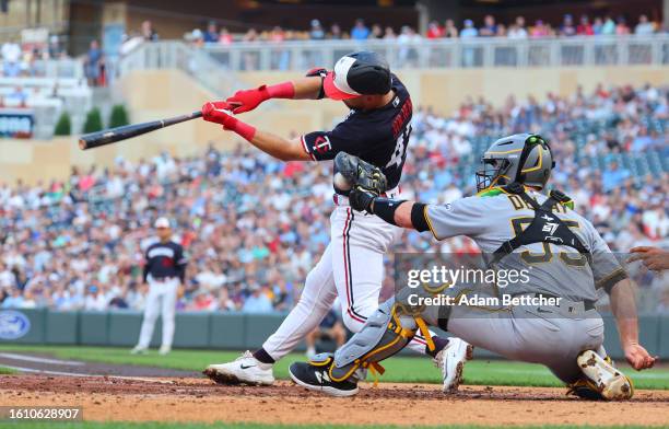 Edouard Julien of the Minnesota Twins strikes out in the third inning against the Pittsburgh Pirates at Target Field on August 19, 2023 in...