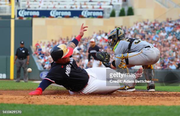 Christian Vazquez of the Minnesota Twins scores a run in the fifth inning against the Pittsburgh Pirates at Target Field on August 19, 2023 in...