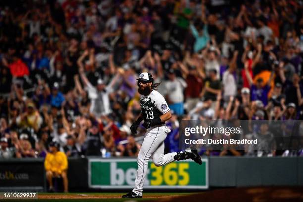 Charlie Blackmon of the Colorado Rockies runs after hitting a seventh inning two-run home run against the Chicago White Sox at Coors Field on August...