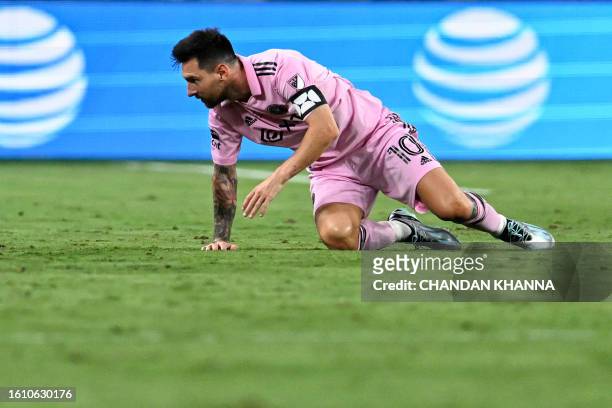 Inter Miami's Argentine forward Lionel Messi gets up after falling during the Leagues Cup final football match between Nashville SC and Inter Miami...