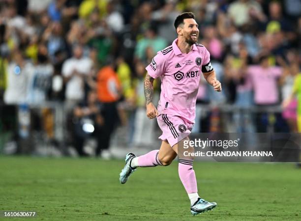 Inter Miami's Argentine forward Lionel Messi celebrates after winning the Leagues Cup final football match against Nashville SC at Geodis Park in...
