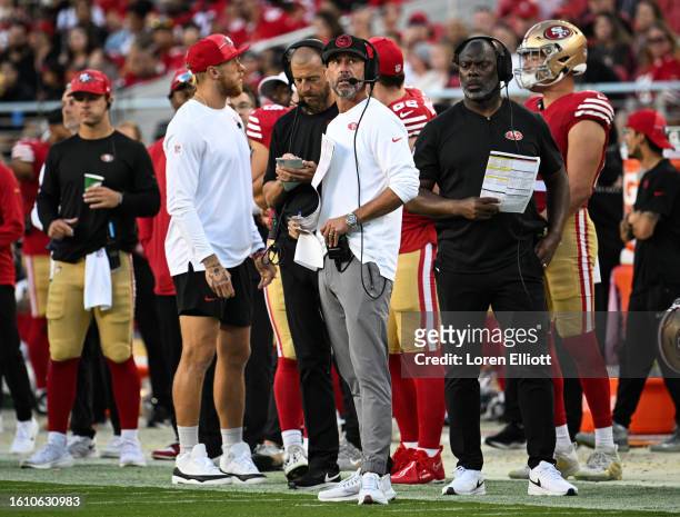 Head coach Kyle Shanahan of the San Francisco 49ers stands on the side line during the second half of a preseason game against the Denver Broncos at...