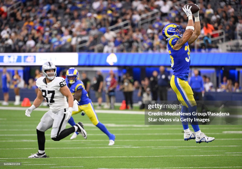 Linebacker Jake Hummel of the Los Angeles Rams intercepts a pass