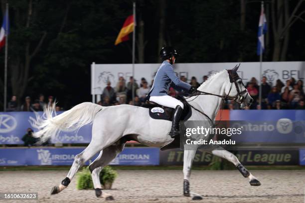 Mimi Gochman, riding Cosmos BH competes during 2023 Major League Show Jumping Grand Prix at Angelstone Tournaments in Erin, Ontario, Canada on August...