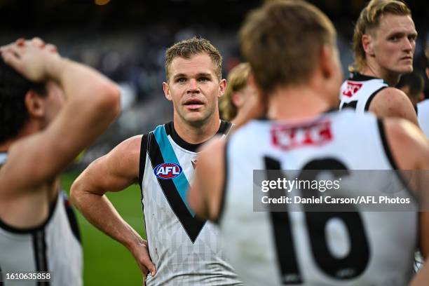 Dan Houston of the Power is happy with the win during the 2023 AFL Round 23 match between the Fremantle Dockers and the Port Adelaide Power at Optus...