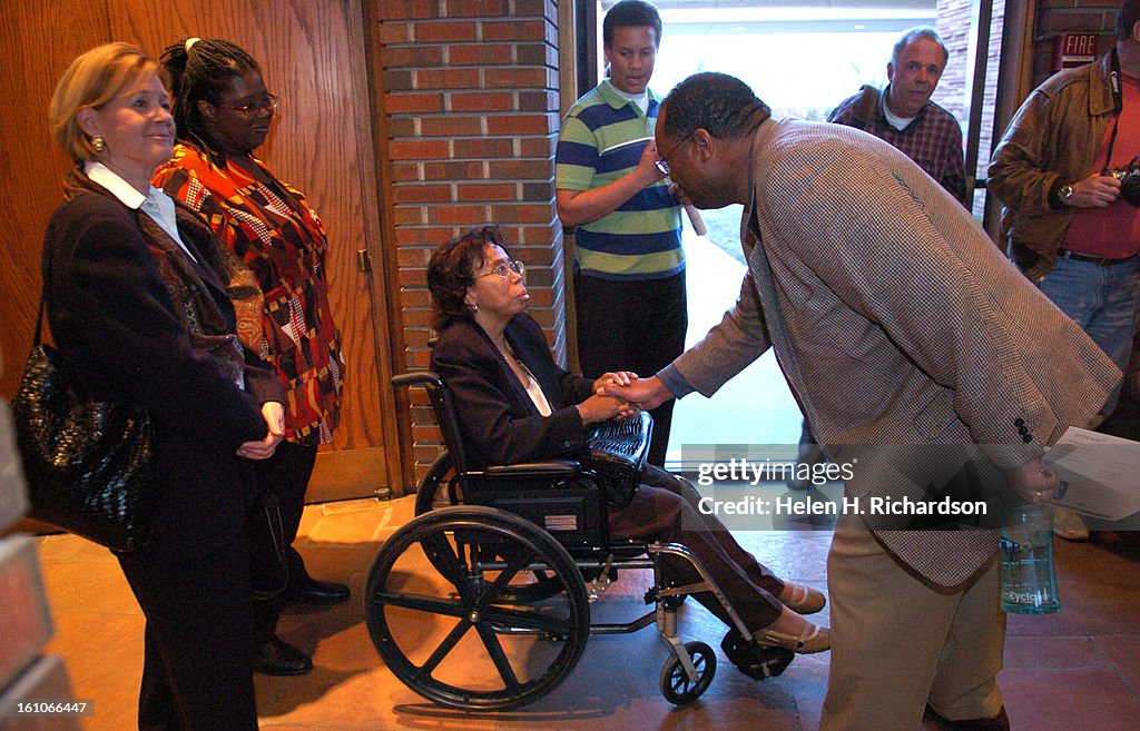 (HR) ABOVE: From her wheelchair Thelma Mothershed meets with enthusiastic fans after the interfaith service. The nine members of what is now called the Little Rock Nine came together for only the 5th time in 50 years at Congregation Emanuel for an interfa