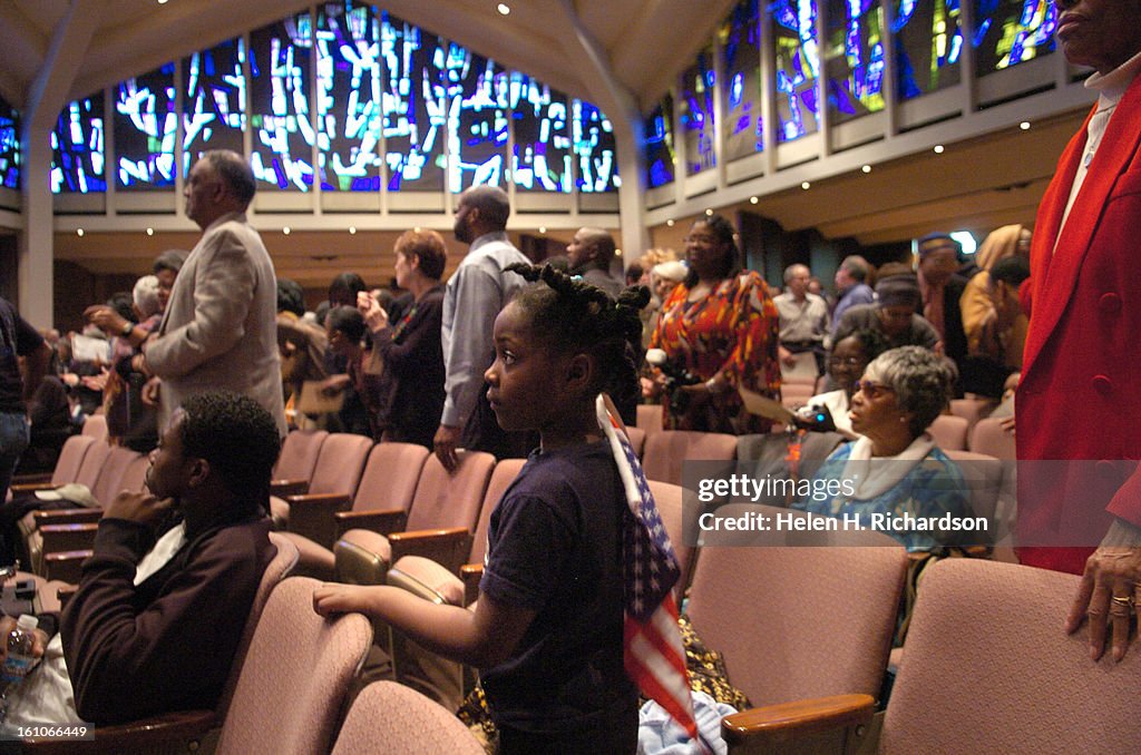 (HR) ABOVE: 6 year old MelYann Ichaka <cq> holds an American flag to show her appreciation for the LIttle Rock Nine during the gathering. The nine members of what is now called the Little Rock Nine came together for only the 5th time in 50 years at Congre