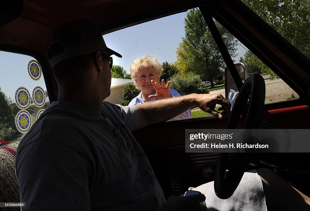 As TIm Masters gears up to move his truck and belongings to Greeley, his cherished Aunt Betty waves a warm goodbye as he leaves. Tim had been living with his Aunt and Uncle Elmer Schneider since his release from prison in January. Helen H. Richardson/The