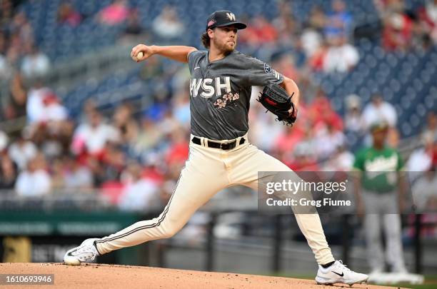 Jake Irvin of the Washington Nationals pitches in the first inning against the Oakland Athletics at Nationals Park on August 12, 2023 in Washington,...