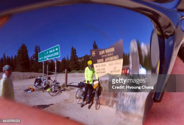 Fe13cstour- Cyclists are having break at Hoosier Pass summit on Wednesday. The group of cyclists are riding from Virginia to Oregon, and going...