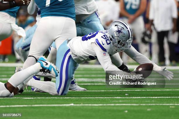 Devin Harper of the Dallas Cowboys recovers a fumble against the Jacksonville Jaguars in a preseason game at AT&T Stadium on August 12, 2023 in...
