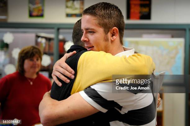 Bncd09hero09c Standley Lake High School senior Cameron Durand hugs Howard Lunger the father of his best friend 16-year-old son Dan Lunger, a popular...