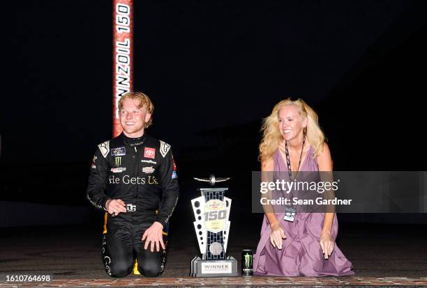 Ty Gibbs, driver of the He Gets Us Toyota, and mother, Heather Gibbs celebrate at the bricks after winning the NASCAR Xfinity Series Pennzoil 150 at...