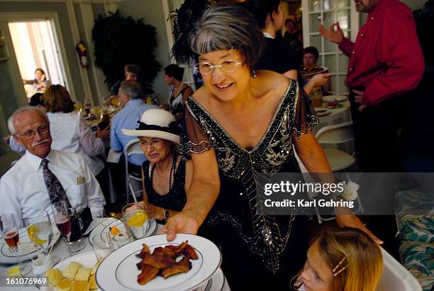 Sue Ellison offered a family tradition to wedding guests a post-ceremony brunch. The hog jowl was served with other selection of pork and pastries....
