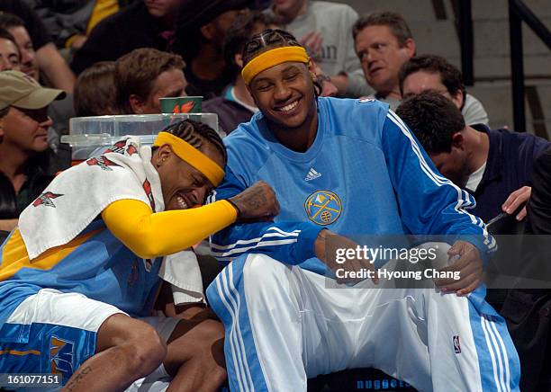 Denver Nuggets Allen Iverson, left, and Carmelo Anthony smile in the bench during 4th quarter of the game against Memphis Grizzlies at Pepsi Center...