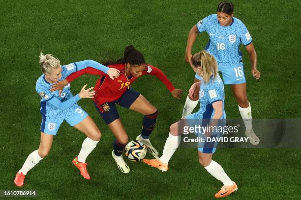 Spain's forward Salma Paralluelo , England's defender Alex Greenwood and England's midfielder Keira Walsh fight for the ball during the Australia and...