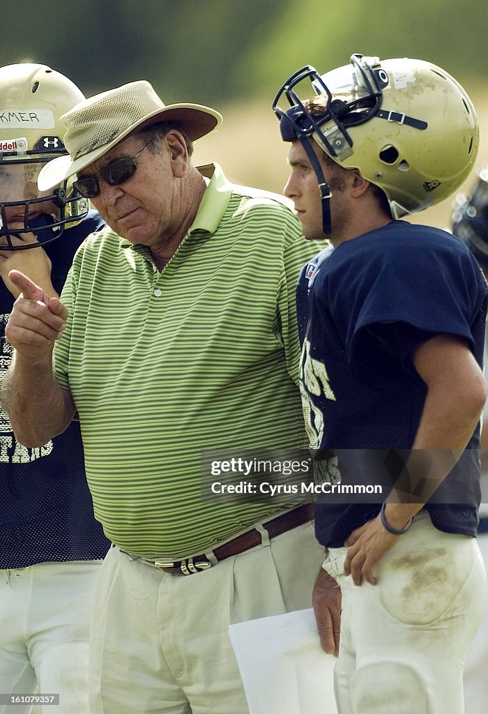 (CM)GREELEY, CO. FRIDAY. AUGUST 17, 2007. Quarterback Rex Morgan (right) at Greeley West is being heavily recruited by BYU. Morgan listens as quarterback coach Kay Dalton (left) , a former UNC coach, talks to the QBs during practice. ( DENVER POST PHOTO B