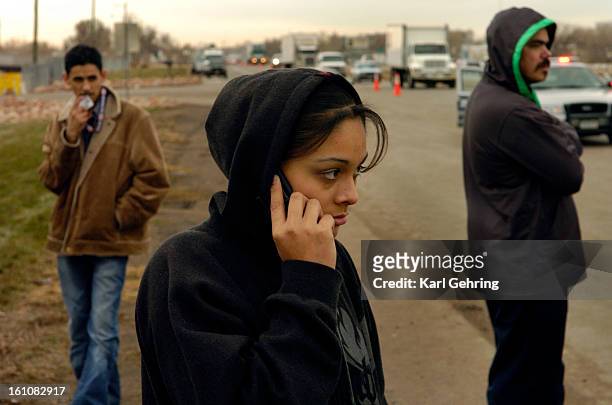 Yesenia Montelongo, center, age 18, left school Tuesday morning to check on her mother who works at the Swift meatpacking plant in Greeley. Her...