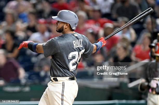 Keibert Ruiz of the Washington Nationals hits the game-winning home run in the ninth inning against the Oakland Athletics at Nationals Park on August...