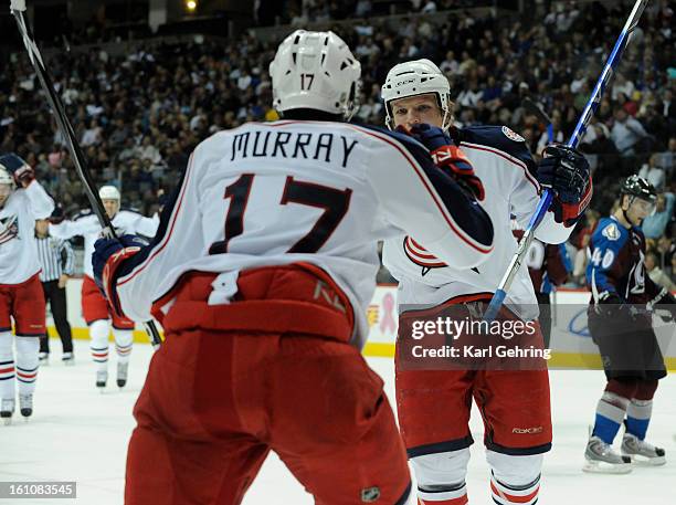 Columbus Blue Jackets right wing Derek Dorsett celebrates with center Andrew Murray after Murray scored in the second period. The Colorado Avalanche...