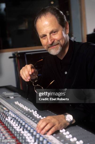 Record producer Eddie Kramer poses at a mixing desk at the SAE Institute Of Technology in New York on May 17, 2000.