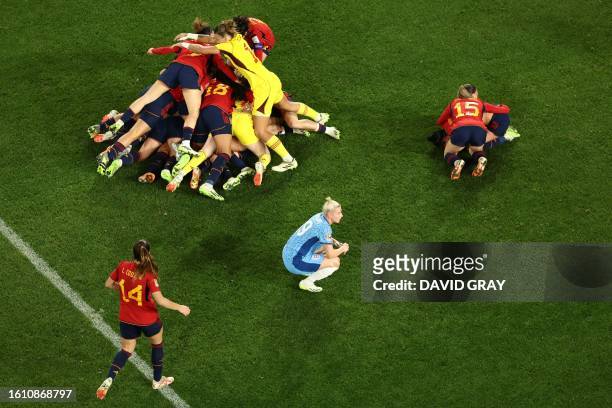 Spain's players celebrate after winning the Australia and New Zealand 2023 Women's World Cup final football match between Spain and England as...
