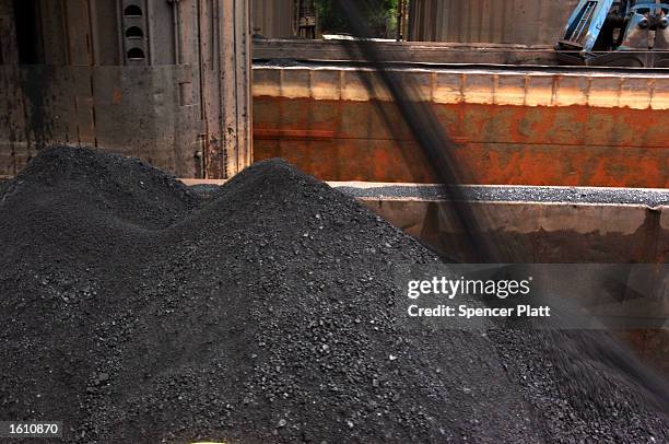 Coal is poured into a barge that will be moved to a steel plant August 26, 2001 in western PA. The coal mining industry, once nearly extinct in...