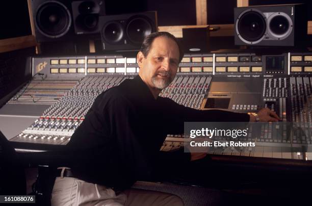 Record producer Eddie Kramer poses at a mixing desk at the SAE Institute Of Technology in New York on May 17, 2000.