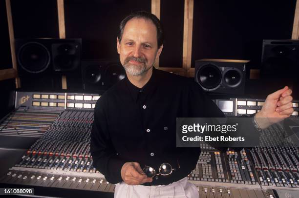 Record producer Eddie Kramer poses at a mixing desk at the SAE Institute Of Technology in New York on May 17, 2000.