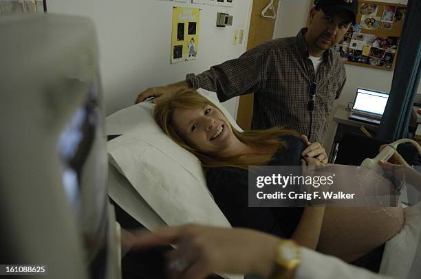 Cd09eggs_CFW-- Beth Griess, of Thorton, CO, and her husband Keith watching an ultrasound of their twin boys with Sonographer Andrea Kirk at the...