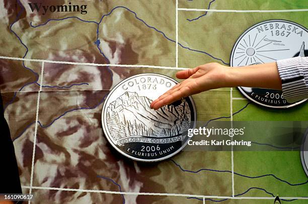 The newest quarter in the United States Mint's 50 State Quarters program was launched Wednesday afternoon at the State Capitol. The Colorado quarter...