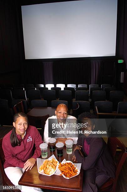 Owners of Neighborhood Flix are from left to right: Melodie Renee Gaul <cq> Director of Operations, Jimmie Lee Smith <cq> Executive DIrector and...