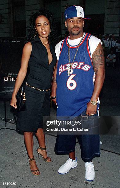 Actress/singer Aaliyah and her boyfriend Damon Dash attend the premiere of "The Others" August 2, 2001 in New York City. Aaliyah and eight others...
