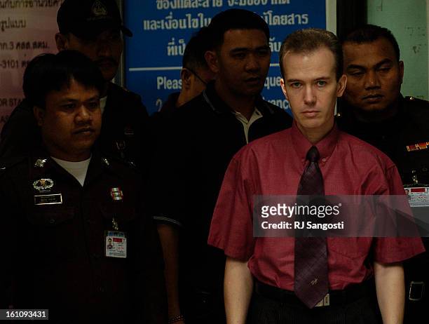 John Mark Karr makes his way out of the Immigration Detention Center, Sunday, Aug. 20 where he was being held. Karr, who arrested in Bangkok Thailand...