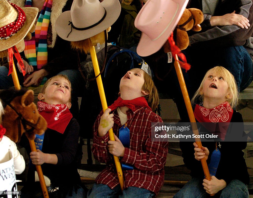 DENVER, CO, Jan. 8, 2007- The Acme Activity Tent just outside of the Expo Hall at the National Western Stock Show hosts a variety of events for kids and their parents including the Stick Horse Grand Prix. Each child receives a stick horse to use, a bandan