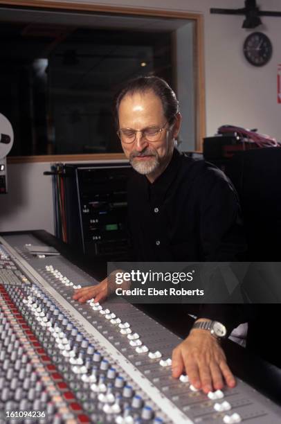 Record producer Eddie Kramer poses at a mixing desk at the SAE Institute Of Technology in New York on May 17, 2000.