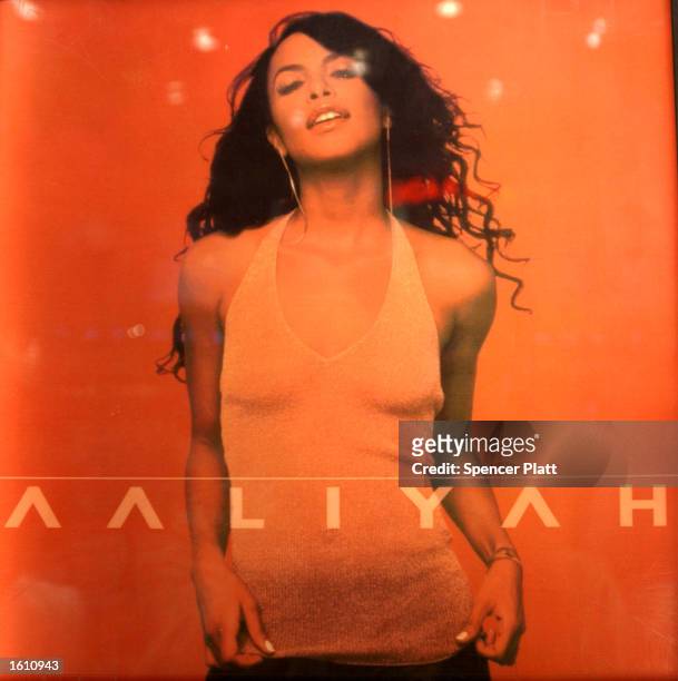 The album cover of former rhythm-and-blues singer and actress Aaliyah is on display at a listening station August 27, 2001 at a Virgin Megastore in...