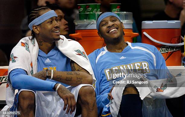 Carmelo Anthony and Allen Iverson relax on the bench at the end of game as the Denver Nuggets and the Memphis Grizzlies game at the Pepsi Center in...