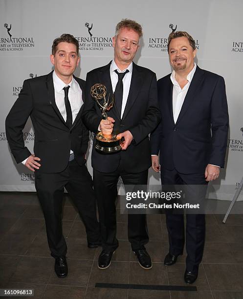 Producer Elliot Jenkins, director John Hay, and principal cast member Eddie Izzard with the Kids; TV Movie/Mini-Series Emmy Award for "Lost...