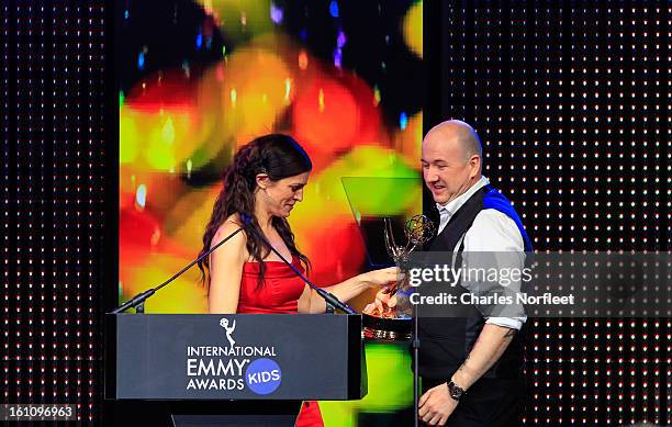 Swedish kids television host Yvla Hallen presents the Kids: Non-Scripted Entertainment Emmy Award to executive producer Arild Halvorsen and director...