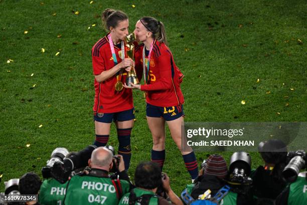 Spain's players celebrate with the trophy after winning the Australia and New Zealand 2023 Women's World Cup final football match between Spain and...