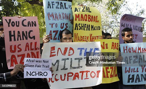 Demonstrators shout slogans during a protest to condemn the hanging of Mohammad Afzal Guru on February 9, 2013 in New Delhi, India. Guru, who was...
