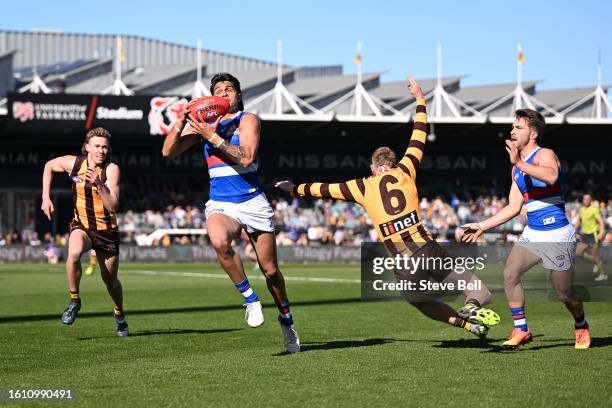 Jamarra Ugle-Hagan of the Bulldogs marks the ball during the round 22 AFL match between Hawthorn Hawks and Western Bulldogs at University of Tasmania...