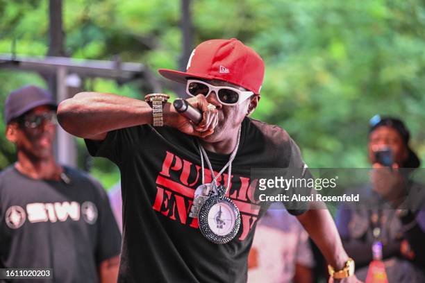 Flava Flav of Public Enemy performs at the fiftieth anniversary of Hip Hop block party near 1520 Sedgwick Ave on August 12, 2023 in The Bronx borough...