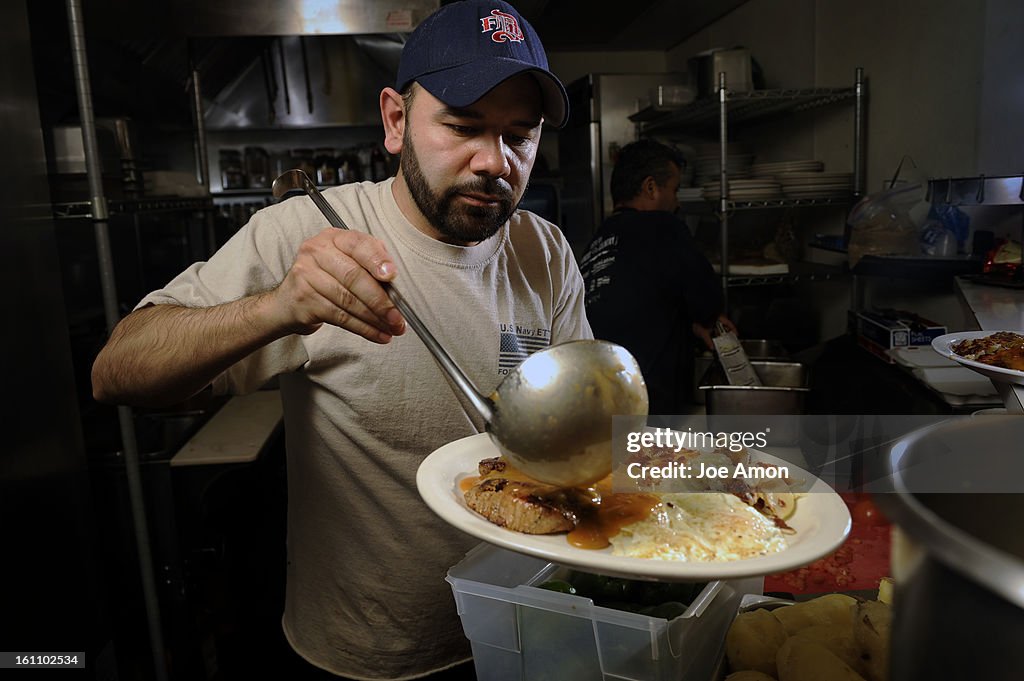 bzxxsmallbiz3a Javier Lopez owns Javier & C Diner on Tennyson Street
