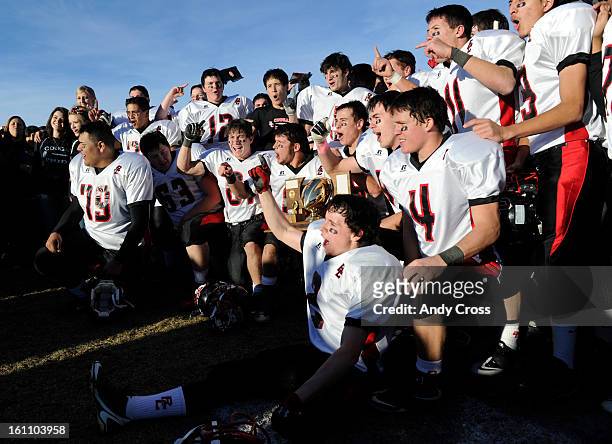 The Burlington Cougars celebrate their Colorado State 1A Championship football over Wray Saturday afternoon, November 27th 2010, at Wray High School....